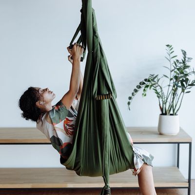 View of a serene empty yoga studio with natural light.